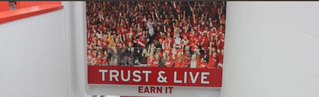 Hockey motivational poster with fans.